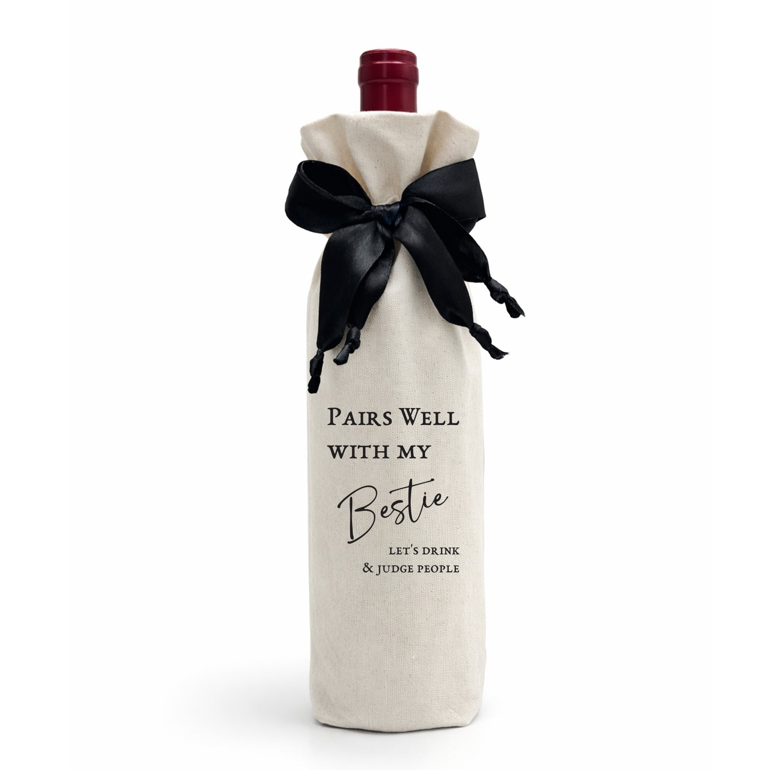 Wine bottle wrapped in a calico cotton gift bag, luxe satin ribbon with black text on a white background, Pairs Well With My Bestie.